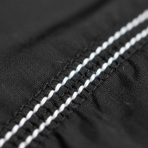 Nuevo Conjunto de Chaqueta y Pantalón Cortavientos de Nailon Tejido con Logotipo Personalizado OEM 2025, Conjunto de Dos Piezas para Hombre, Ropa Casual - Product Image 2