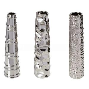 Juego de 3 Jarrones de Flores de Hierro Costero Plateados, de Aluminio Pulido Brillante de Excelente Calidad, con Forma Única - Product Image 1