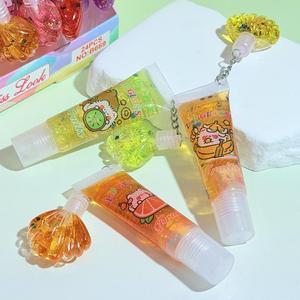Brillo Labial Vegano Miss Look con Purpurina Transparente, Tapa Impermeable con Llavero, Efecto Hidratante y Voluminizador para la Familia de Frutas - Product Image 1