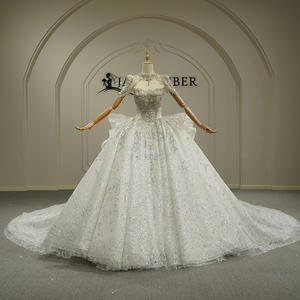 Vestido de Novia Sirena con Apliques de Encaje, Pedrería, Manga Corta, Borlas y Cristales, Modelo GT26053, con Cola Capilla - Product Image 1