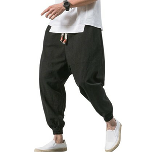 Pantalon de survêtement respirant noir à taille élastique et entrejambe tombant, personnalisé et élégant, unisexe, 100 % polyester, collection 2024 - Product Image 1