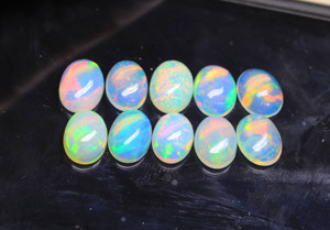 Piedra preciosa de cabujón de forma ovalada de ópalo etíope natural-Gemas llamativas de arcoíris de alto grado-Cabinas sueltas suaves para la fabricación de joyas - Product Image 3