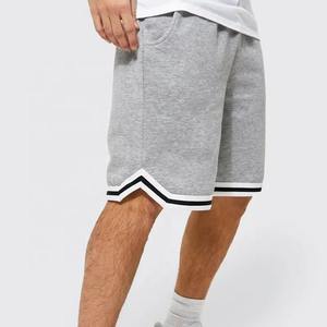 Venta al por mayor de pantalones cortos de gimnasio con logotipo personalizado 100% algodón para fitness, pantalones cortos de baloncesto transpirables cómodos de ajuste holgado - Product Image 1