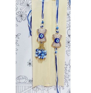 Vente chaude Nouveau Design Fait À La Main Plaqué Or Rakhi Raksha Bandhan Bracelet Accessoires à la Vente en Gros à Excellent Prix - Product Image 1