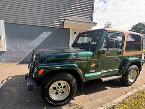 JEEP WRANGLER SAHARA 4X4 USADO DE 1999, CON VOLANTE A LA IZQUIERDA/DERECHA - Product Image 3