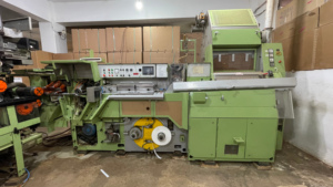 Máquina de procesamiento de cigarrillos Hauni Protos 80/5000 con máquina de llenado de bandeja adjunta cigarrillos/minuto - Product Image 2