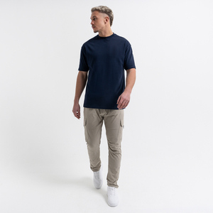 เสื้อยืดโอเวอร์ไซส์ผ้าฝ้ายพรีเมียม 100% สำหรับใส่ลำลอง เล่นกีฬา หรือออกกำลังกาย แขนสั้น - Product Image 1