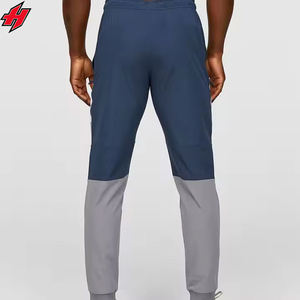 Ensemble de survêtement personnalisé en polyester décontracté pour homme Ensemble de survêtement coupe-vent et pantalon de jogging avec ensemble de survêtement cargo en nylon - Product Image 4