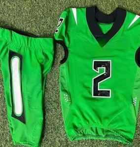 La más alta calidad de diseño personalizado sublimación jóvenes uniformes de fútbol americano aparejos sarga Jersey pantalones integrados - Product Image 1