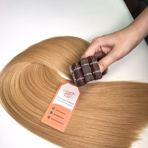 Hot Trend Brown Tape Straight Vietnamita Raw Onda sin procesar Cutícula completa Alineada Extensiones de cabello humano Precio al por mayor Pelucas - Product Image 1
