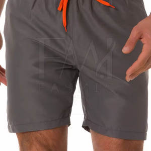 Pantalones cortos cortavientos para hombre estilo callejero con cierre de cordón para exteriores, ropa deportiva transpirable impermeable con patrón sólido para correr - Product Image 5