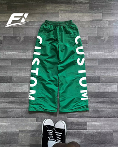 Pantalones deportivos casuales de nailon de peso medio personalizados, de pierna ancha, holgados, de secado rápido, transpirables, con estampado por transferencia térmica, para hombre, al por mayor - Product Image 4
