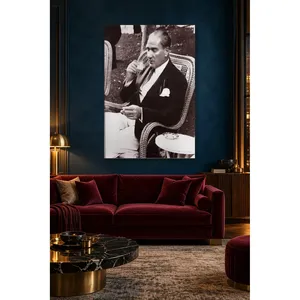 Fida Ataturk buvant du café dans un fauteuil en osier, impression sur toile - Product Image 1
