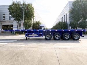 รถพ่วงพื้นเรียบ 4 เพลา Rhinox Steel พร้อมขนาดที่ปรับแต่งได้สำหรับการขนส่งหนัก - Product Image 6
