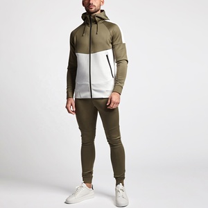 Conjunto Deportivo de Dos Piezas para Hombre, Diseño a Rayas Transpirable para Otoño, con Detalle de Bloques y Cuello Alto - Product Image 1