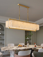 Luminaire suspendu moderne de luxe en forme de tambour, en albâtre naturel et laiton doré, pour salons, villas et hôtels.
