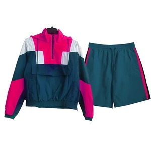 Conjunto de pantalones cortos y chaquetas de nailon de poliéster, traje de jogging para hombre, conjuntos cortos cortavientos de gran tamaño con contraste de Color de retazos para hombre - Product Image 2