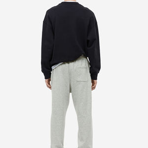 กางเกงออกกำลังกายสีดำสำหรับผู้ชายพิมพ์ลายผ้าคอตตอนสีพื้นสำหรับใส่ไปยิมฟิตเนส - Product Image 3