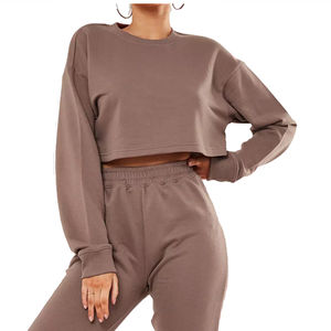 Chándal de invierno personalizado de alta calidad OEM para mujer, conjunto de 2 piezas, Top corto con capucha y pantalones de chándal, chándal en blanco para correr para mujer - Product Image 1