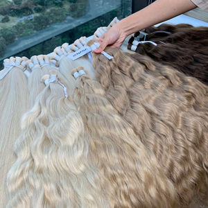 ผมต่อแท้แบบเวอร์จิ้น 100 กรัม ยาว 28 นิ้ว คุณภาพสูง สีน้ำตาลธรรมชาติ ลอนสวย แบบซุปเปอร์ดับเบิ้ลดรอน - Product Image 1