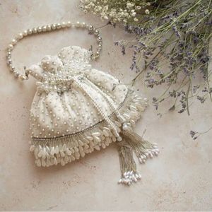 STUNNING & BEAUTIFUL-<b>WHITE</b>-IVORY Potli Bag with EMBELLISHED PEARLS,Crystal Glass Beads EMBROIDERY Work for Party/Wedding=2024 - Product Image 1