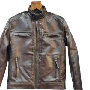 C'est une veste en cuir marron avec un col montant et plusieurs poches zippées. - Product Image 1