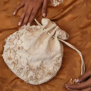 ELEGANT EMBROIDERY on WHITE <b>POTLI</b> WRIST <b>BAGS</b> EMBELLISHED CRYSTAL GLASS BEADS,STONE,PEARLS EMBROIDERY for PARTY-WEAR/WEDDING@2024 - Product Image 1