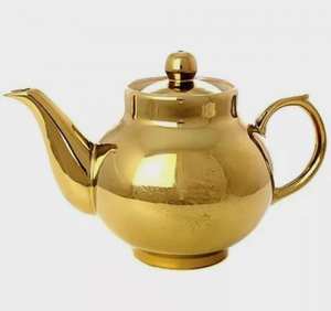 Modern minimalist brass metal tea <b>kettle</b> with smooth pouring spout heat resistant handle energy efficient for home kitchen use - Product Image 1