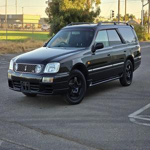 NISSAN STAGEA RS FOUR V 1999 D'OCCASION CÔTÉ GAUCHE/DROIT - Product Image 1