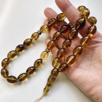 Collier artisanal écoresponsable en ambre de la Baltique avec 33 perles d'ambre vertes et insectes, Tasbih musulman, bijoux Amberstone