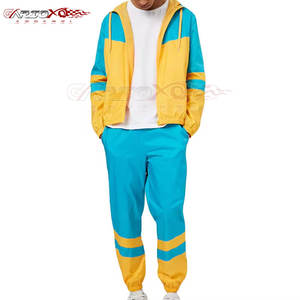 Traje cortavientos de rendimiento para hombres con diseño antiviento y absorbente de sudor, traje cortavientos suave y ligero - Product Image 1