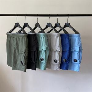 Shorts de sport tendance pour hommes, en spandex/polyester, à séchage rapide, unis, décontractés, pour l'été, pour la plage, avec cordon de serrage - Product Image 4