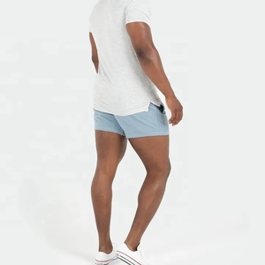 กางเกงขาสั้นเบอร์มิวดาสำหรับผู้ชายผ้าคอตตอนสีทึบเสื้อผ้าใส่เล่นยิมย้อมสีล้วนสไตล์ลำลองโลโก้ออกแบบได้ตามต้องการ - Product Image 3