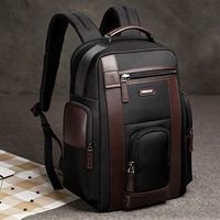 Mochilas universitarias unisex con logotipo personalizado, mochila impermeable negra de moda suave caliente con forro de cuero genuino y cierre de cremallera
