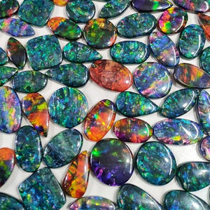 Piedras de amolita Rojas cabujón ovalado Piedras de vidrio Ammolita para joyería - Product Image 2