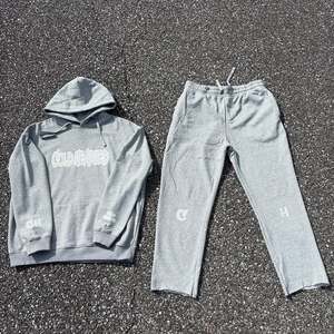 Chaqueta cortavientos de gran tamaño de alta calidad con capucha y pantalones de chándal conjunto deportivo informal transpirable para hombres Streetwear Jogger trajes - Product Image 1