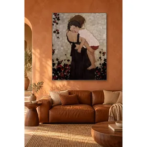 Impression sur toile : Mère Fida portant un enfant endormi sur son épaule - Product Image 1
