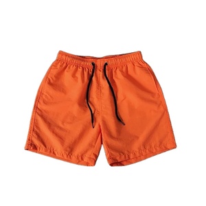 Nouveaux shorts de plage confortables à séchage rapide pour hommes maillots de bain en soie avec cordon de serrage élastique à la taille motif solide - Product Image 6