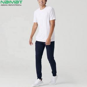 Pantalon de jogging uni doux et extensible pour hommes, décontracté, athlétique, coupe ajustée, taille élastique, poche à cordon, vente en gros de polyester et d'élasthanne - Product Image 6