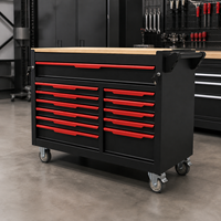 Coffre à outils mobile professionnel noir et rouge à douze tiroirs avec plan de travail en bois pour l'organisation de garage et d'atelier