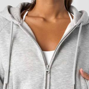 Sudadera con capucha recortada con cremallera para mujer a la moda en tela de mezcla de algodón suave, sudaderas informales de manga larga con cordón ajustable para pedidos a granel - Product Image 2