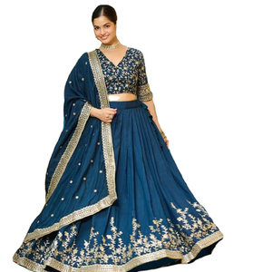Presentamos una falda voluminosa combinada con un choli estructurado y una dupatta a juego, hechas con materiales de seda de alta calidad. - Product Image 1