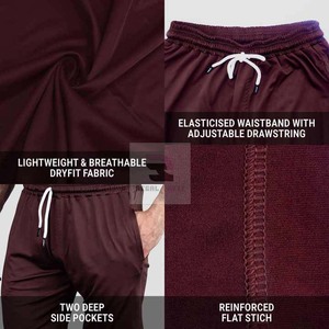 Pantalones cortos atléticos para hombre con cintura elástica Pantalones cortos de estilo casual de patrón sólido transpirable con bolsillos - Product Image 6