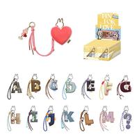 POPMART Original Pin for Love Blind Box Porte-clés PVC Monsters Pin for Love Series Pendentif Lettre Design Aléatoire