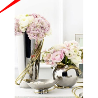 Floreros de metal de diseño de lujo para decoración de bodas Maceta con acabado de alta gama