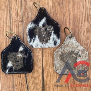 Vente en gros de porte-clés gravés au laser en cuir de vachette avec design personnalisé porte-clés de luxe en cuir véritable cadeaux promotionnels - Product Image 1