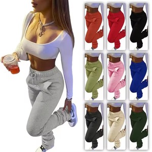 Joggers informales de cintura alta para mujer OEM ODM: Pantalones deportivos con bolsillos y cordón con decoración de logotipo de encaje - Product Image 1