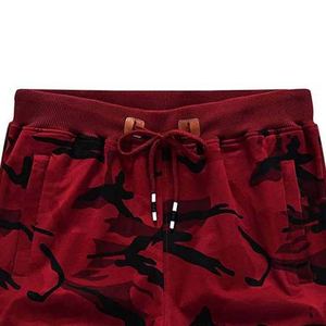 Shorts pour hommes respirants personnalisés en polyester, tissu doux, impression par sublimation, coupe décontractée élastique, design sportif actif de haute qualité - Product Image 2