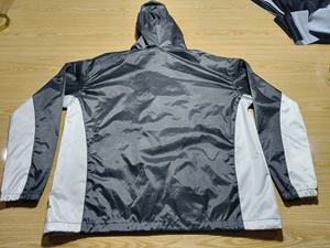 Chaqueta Cortavientos Unisex de Lona Delgada, Impermeable, con Bordado de Dibujos Animados y Capucha - Product Image 2