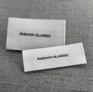 Etichette in cotone serigrafate in tessuto di cotone personalizzato all'ingrosso per abbigliamento